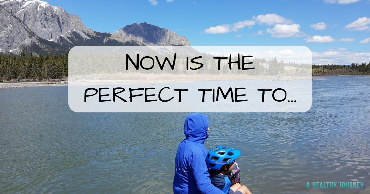 woman and kid sitting near a river with mountainous background, caption states, "Now is the Perfect Time to..."